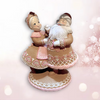 DANCING PINK GINGERBREAD MR AND MRS CLAUS
