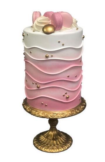 PINK CAKE ON GOLD PEDESTAL
